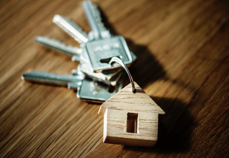 keychain with wooden house